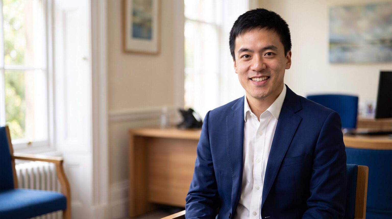 Mr Gareth Chan at his desk